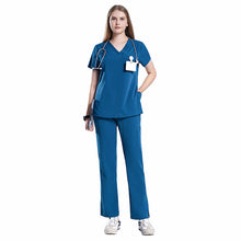 Load image into Gallery viewer, The 10-Pocket Scrub Set with Curved Cut Pants
